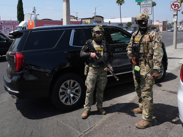 AP25287074053488 FILE - Immigration agents conduct an operation at a car wash, Aug. 15, 2025, in Montebello