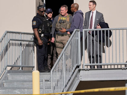 Title: Georgia Elections Investigation Image ID: 26028751611580 Article: FBI officers are