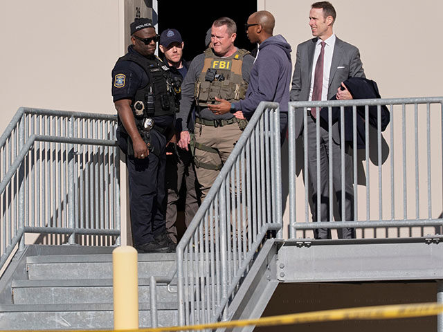 Title: Georgia Elections Investigation Image ID: 26028751611580 Article: FBI officers are