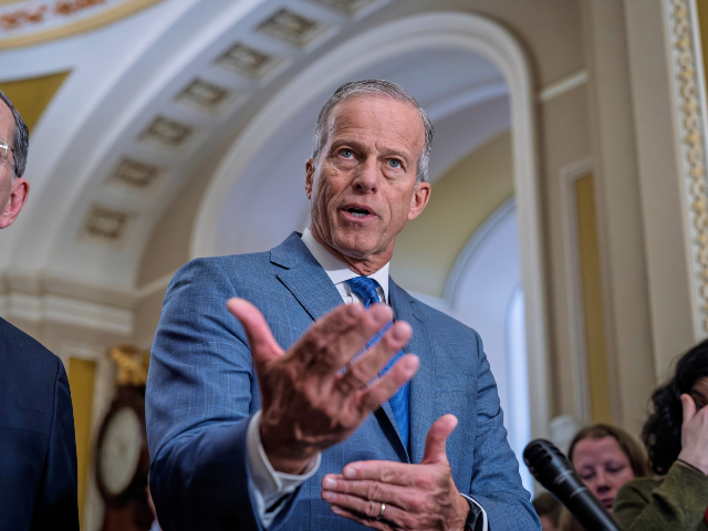 Senate Majority Leader John Thune, R-S.D., joined at left by Sen. John Barrasso, R-Wyo., t