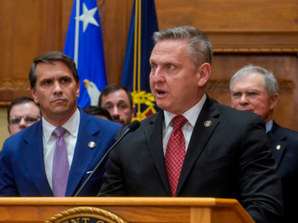 Acting U.S. Attorney General Todd Blanche, left, is joined by recently confirmed Alcohol,