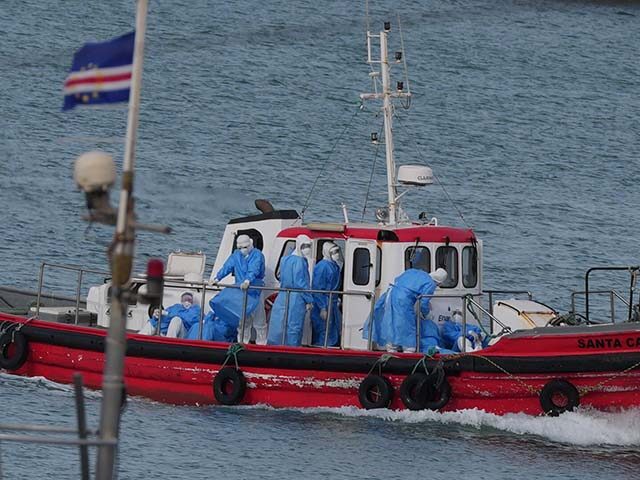 Title: Cape Verde Hantavirus Ship Image ID: 26126405744228 Article: Health workers in prot