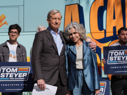California gubernatorial candidate Tom Steyer, left, shares a moment with Jane Fonda durin
