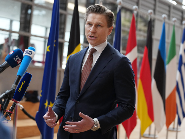 Finland's Defense Minister Antti Hakkanen speaks with the media as he arrives for a m