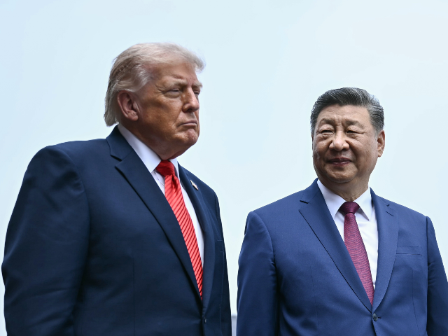 China's President Xi Jinping, right, and U.S. President Donald Trump visit the Temple