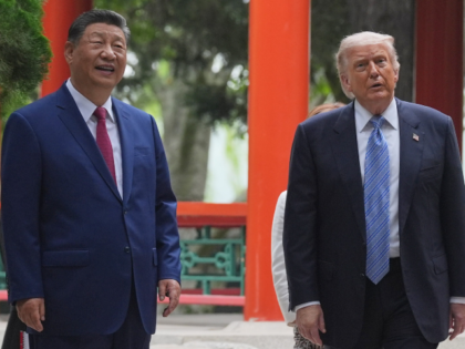 President Donald Trump talks with China's President Xi Jinping at the Zhongnanhai lea