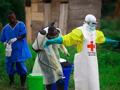 Title: Congo Ebola Image ID: 26135314889340 Article: FILE - A health worker sprays disinfe