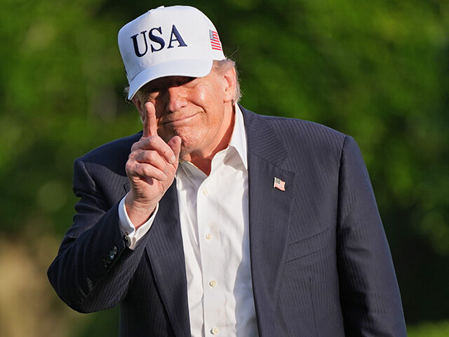 Title: Trump China Image ID: 26135832932963 Article: President Donald Trump gestures to r