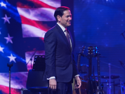 United States Secretary of State Marco Rubio arrives on stage to speak at an event celebra