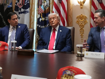 President Donald Trump, center, attends a Cabinet meeting at the White House, Wednesday, M