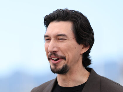 Adam Driver poses during the "Paper Tiger" photocall at the 79th annual Cannes F