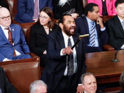 Al Green Washington, DC - March 4: Rep. Al Green (D-Texas) yells toward President Donald Trump as h
