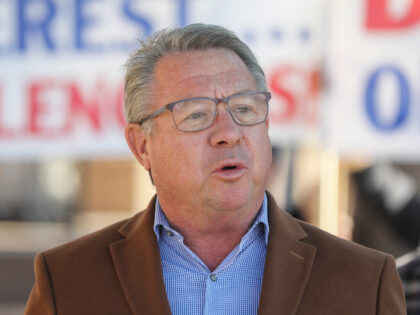 El Cajon Mayor Bill Wells stands along with other community leaders in opposition to a pro