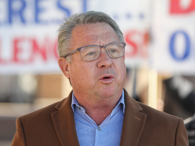 El Cajon Mayor Bill Wells stands along with other community leaders in opposition to a pro
