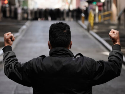 A protester faces the police during an anti-government protest in La Paz, Bolivia, Monday,