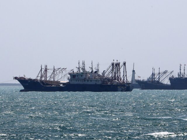 Ships sail in the Gulf off the Iranian port city of Bandar Abbas, which is the main base o