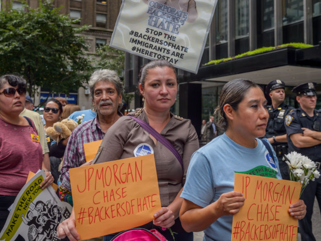 GettyImages-1229038422 JPMORGAN CHASE HEADQUARTERS, NEW YORK, UNITED STATES - 2018/09/26: Hundreds of protesters,