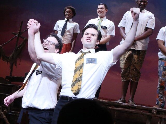 Jordan Matthew Brown and Kevin Clay during the curtain call for "The Book of Mormon" on Br