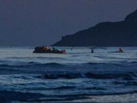 Channel Crisis: Two Dead, 16 Injured as Overcrowded Migrant Boat Runs Aground