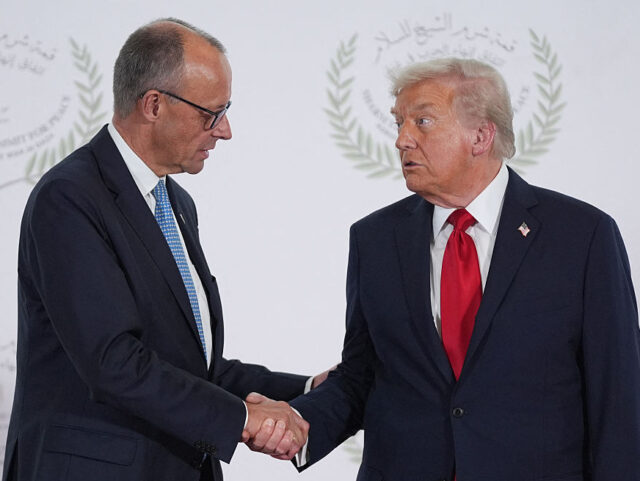 US President Donald Trump greets Germany's Chancellor Friedrich Merz during a summit