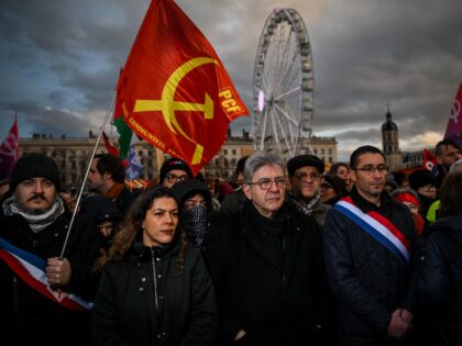 Leader of French left-wing La France Insoumise (LFI) party Jean-Luc Melenchon (C) with dep