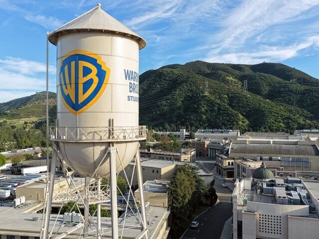 In an aerial view, the Warner Bros. logo is displayed on the water tower at Warner Bros. S