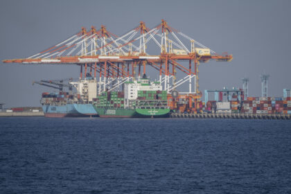 Cargo ships are seen docked at the international cargo terminal in Yokohama, Kanagawa Pref