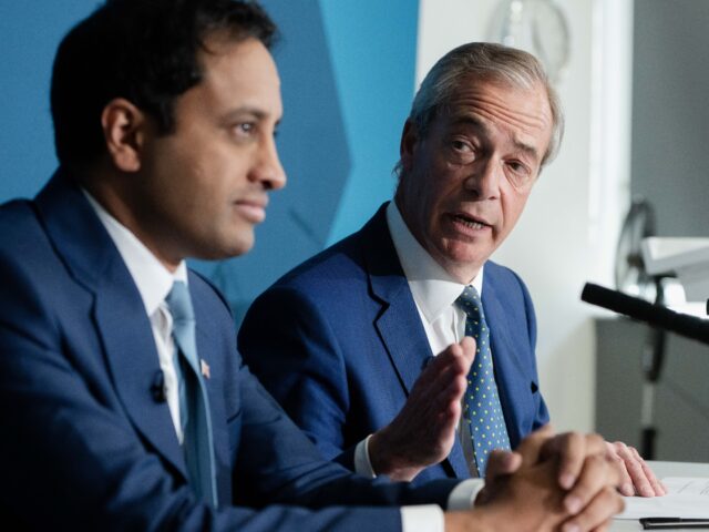 LONDON, UNITED KINGDOM - APRIL 20: Nigel Farage (R), leader of Reform UK, and Zia Yusuf (L