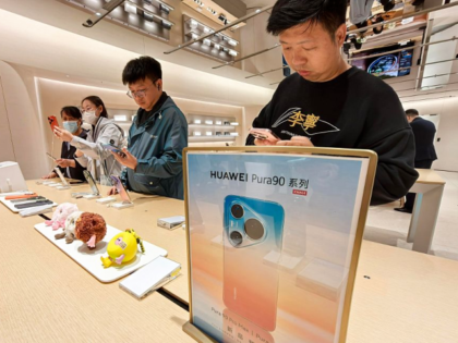 NANJING, CHINA - APRIL 20: Customers experience the newly released Huawei Pura 90 series s
