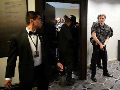 Law enforcement officers respond following reports of a shooting during the White House Co