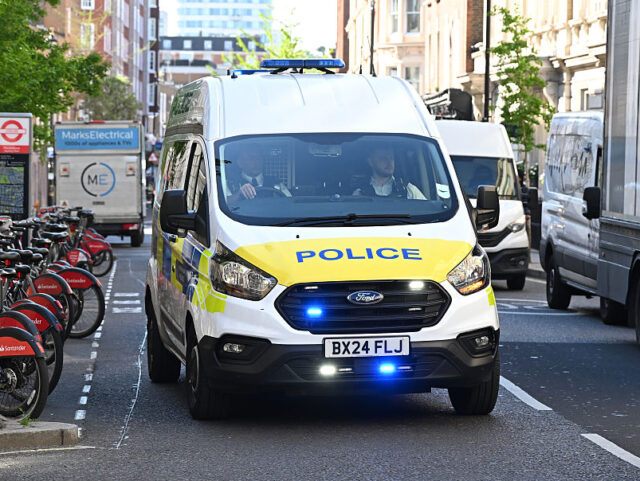 LONDON, ENGLAND - MAY 01: A Police van arrives at Westminster Magistrates' Court as E