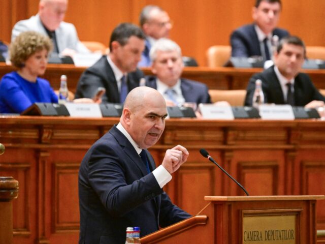 Romanian Prime Minister Ilie Bolojan addresses the Parliament in Bucharest on May 5, 2026.
