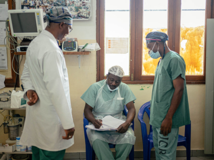 Doctor Soumah Sekou Amadou (L), a senior surgeon working with the International Committee