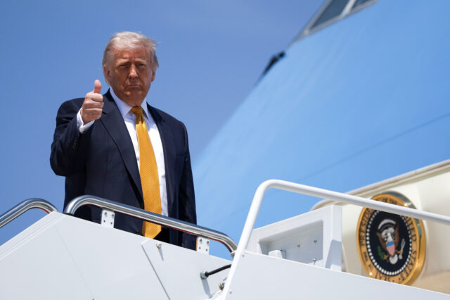 JOINT BASE ANDREWS, MARYLAND - MAY 12: U.S. President Donald Trump gestures as he boards A
