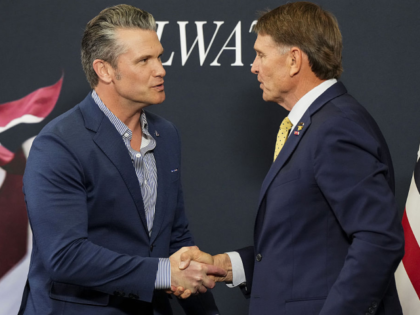Pete Hegseth, US secretary of defense, left, and Ed Gallrein, Republican Congressional can