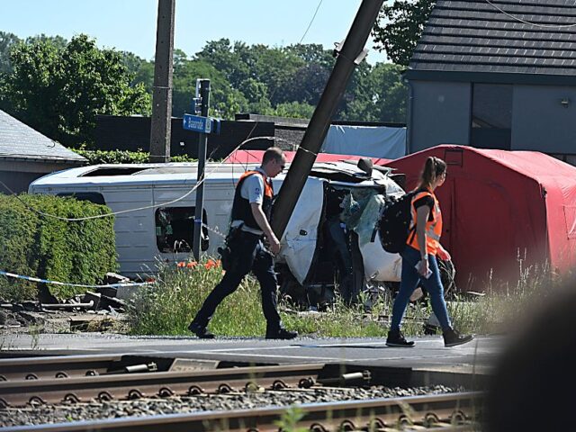 Schoolbus Gets Run Over By A Train BUGGENHOUT, BELGIUM - MAY 26 : Lisa De Wilde, Kurt Moens NV-A ( Deputy Provincial Educatio