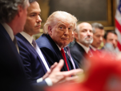 WASHINGTON, DC - MAY 27: U.S. President Donald Trump (C) listens as U.S. Interior Secretar