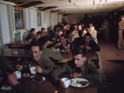 FAYETTEVILLE, NC - 1942: A view of army soldiers in the mess hall at Fort Brag in Fayettev