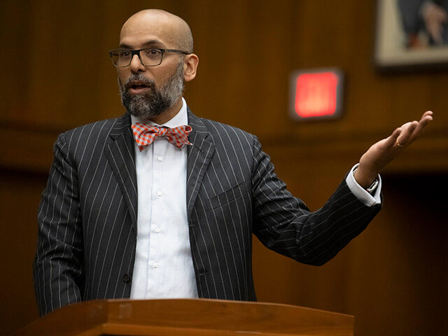 Magistrate Judge Zia M. Faruqui speaks before a debate between incarcerated students and J