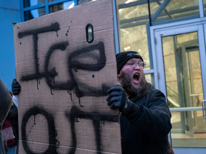 A man shouts slogans against the US Immigration and Customs Enforcement (ICE) while protes