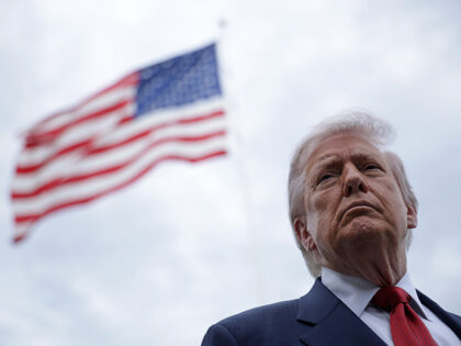 U.S. President Donald Trump speaks to members of the media prior to a Marine One departure