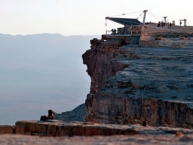 A picture taken on October 12, 2017, shows people gathering at the Ramon observation point