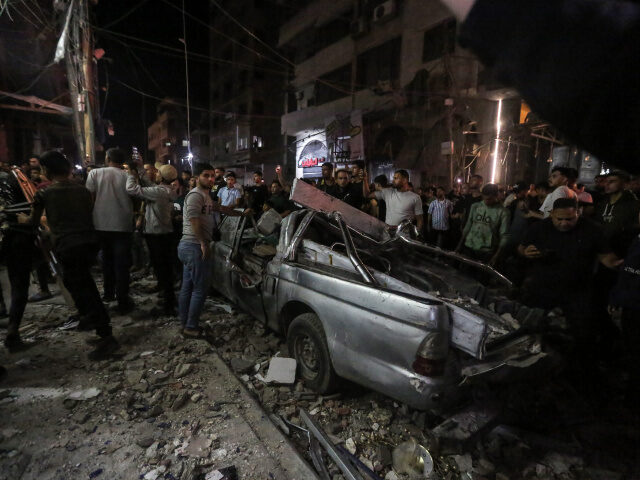 Israel Targets Mohammed Odeh mergency teams arrived at the scene following Israeli airstrikes on a residential building
