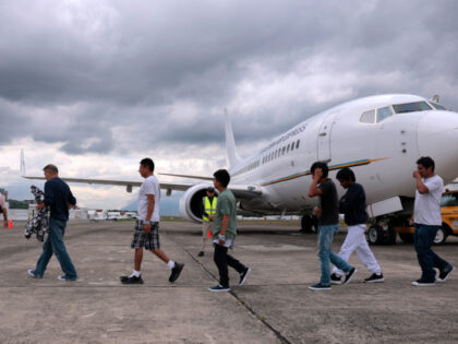Migrants Deported to Safe Third Countries People deported from the United States disembark a repatriation flight as US Homeland Secu
