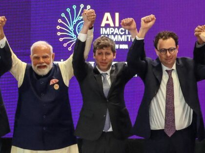 Sam Altman and Dario Amodei on stage with Indian leader Modi
