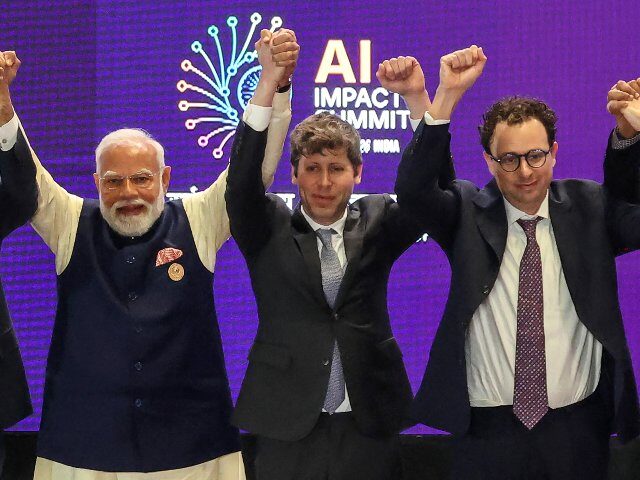 Sam Altman and Dario Amodei on stage with Indian leader Modi