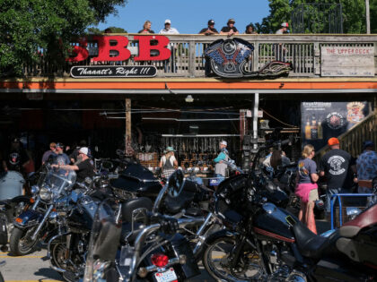 Motorcycles are seen parked in front of a bar during Myrtle Beach Bike Week in Myrtle Beac