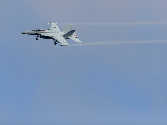 A U.S. Navy EA-18G Growler turns on to final approach at Ault Field NAS Whidbey Island, Wa