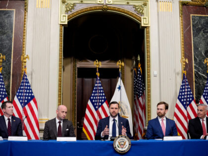 U.S. Vice President JD Vance, accompanied by (L-R) Department of Justice Assistant Attorne