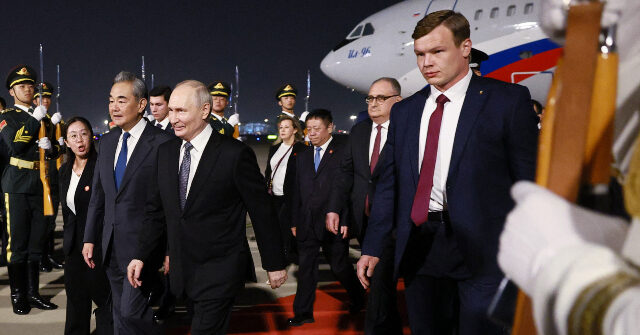 China Gives Visiting Vladimir Putin the Red Carpet Treatment Days After Trump Trip